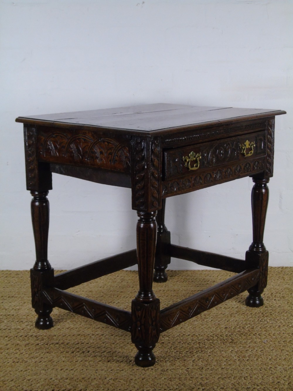 A fabulous 17th century oak side table View XV