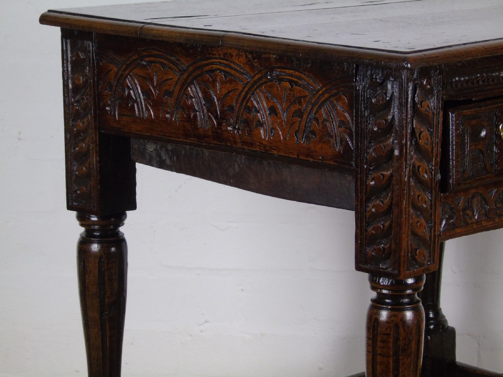 A fabulous 17th century oak side table View XVI