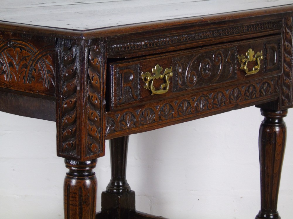 A fabulous 17th century oak side table View XVIII