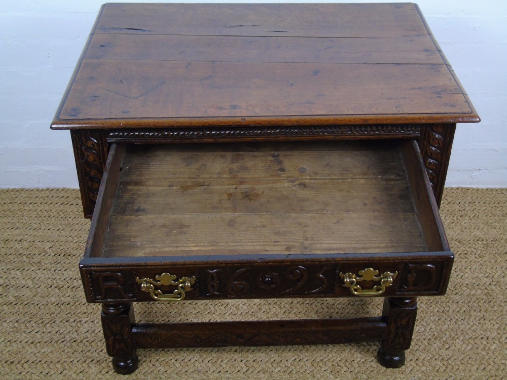 A fabulous 17th century oak side table View XIX