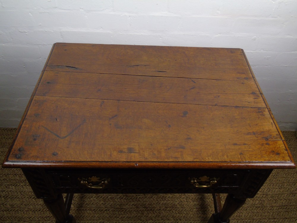 A fabulous 17th century oak side table View XXV