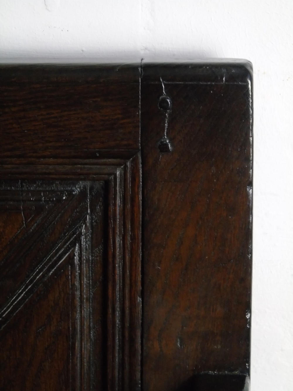 A rare and unusual early 17th Century settle.  View VII