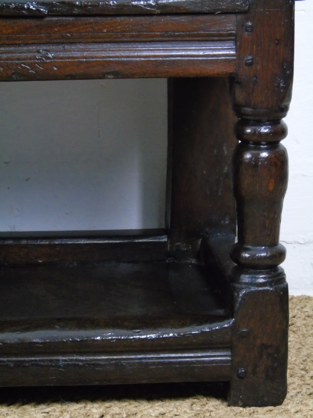A rare and unusual early 17th Century settle.  View XII