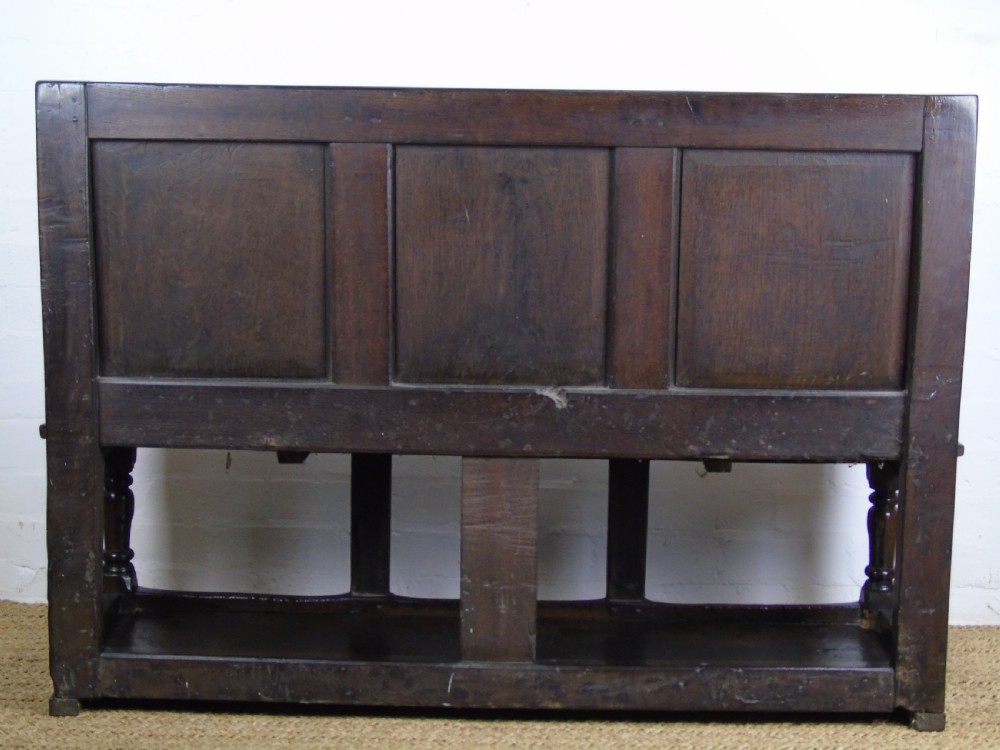 A rare and unusual early 17th Century settle.  View XXV