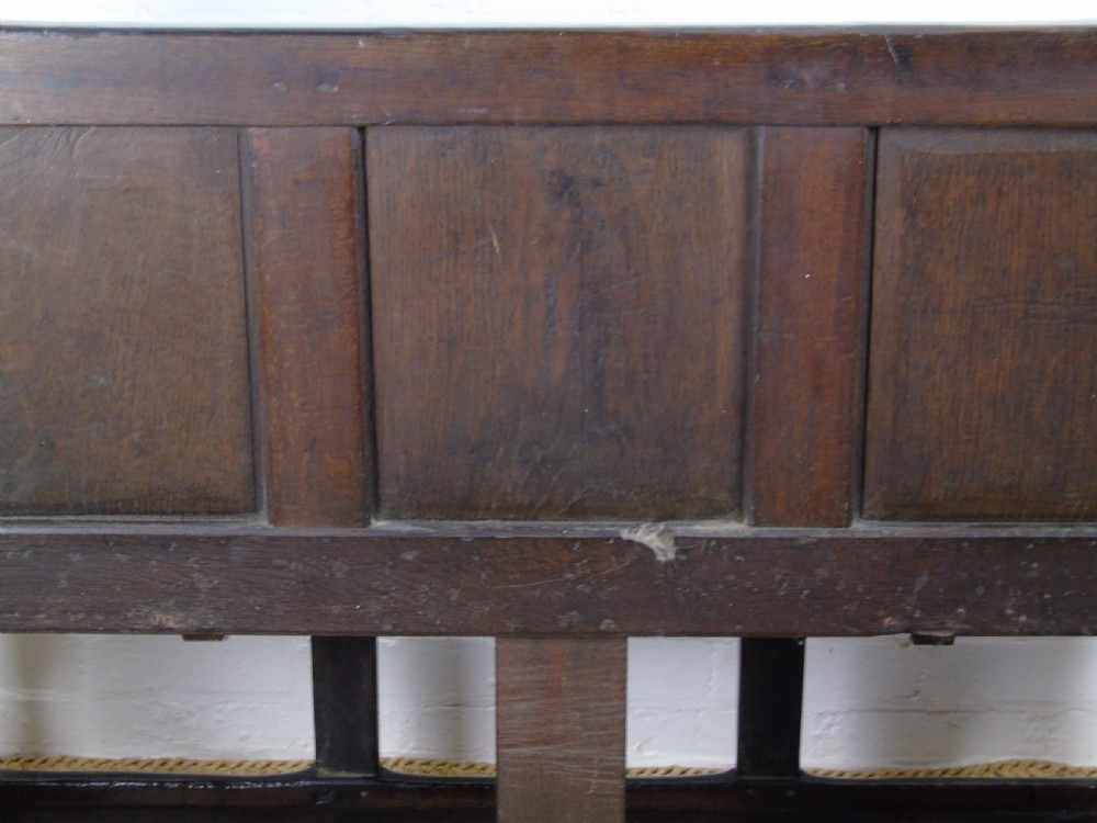 A rare and unusual early 17th Century settle.  View XXVIII