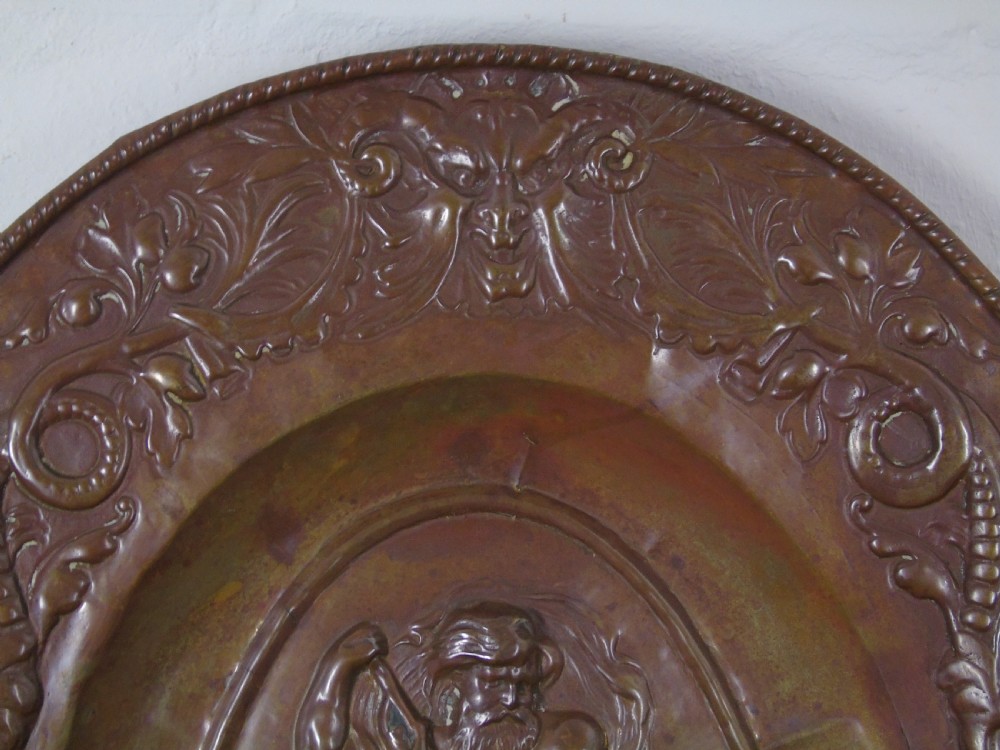 An early 18th Century repousse copper wall hanging platter View II