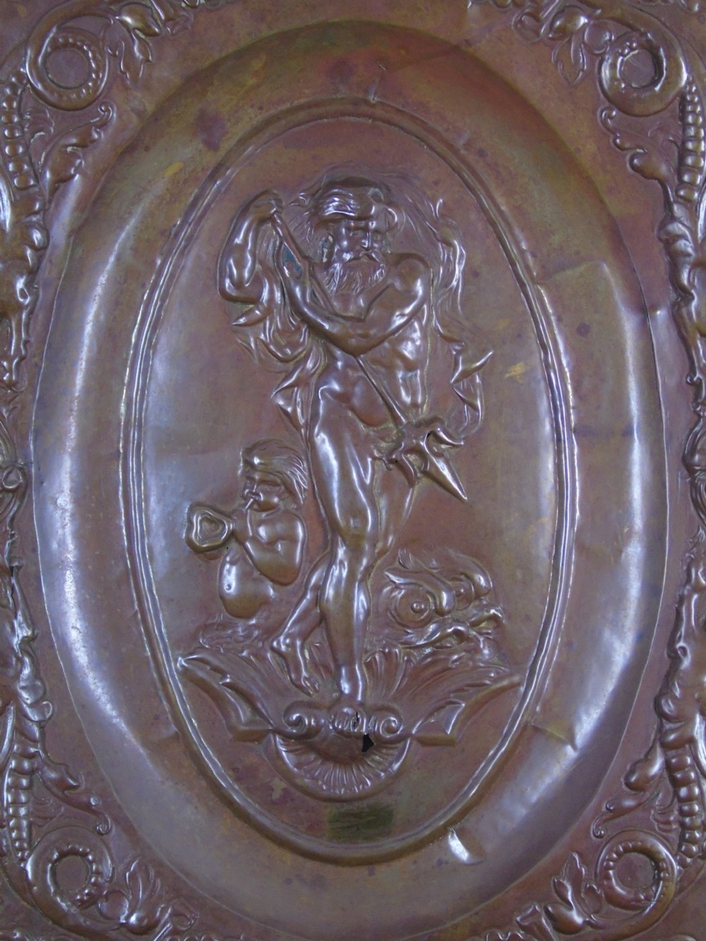 An early 18th Century repousse copper wall hanging platter View III