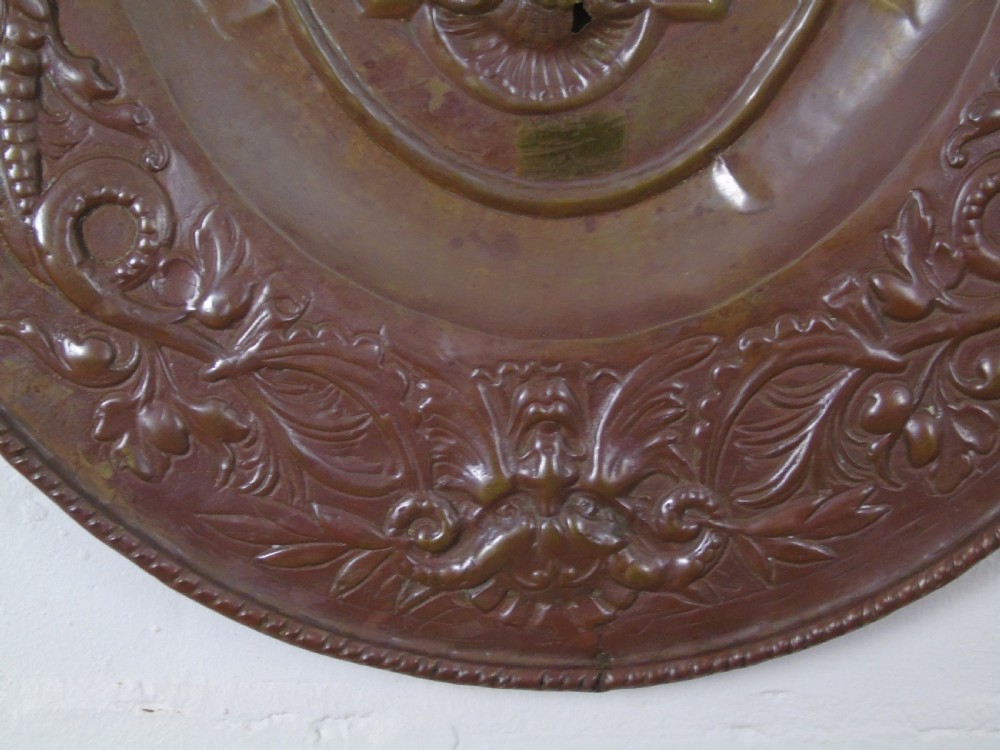 An early 18th Century repousse copper wall hanging platter View IV