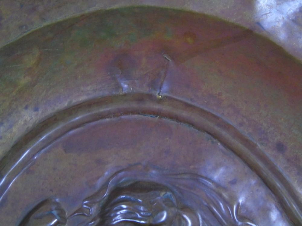 An early 18th Century repousse copper wall hanging platter View VI