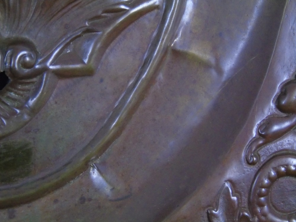 An early 18th Century repousse copper wall hanging platter View VIII