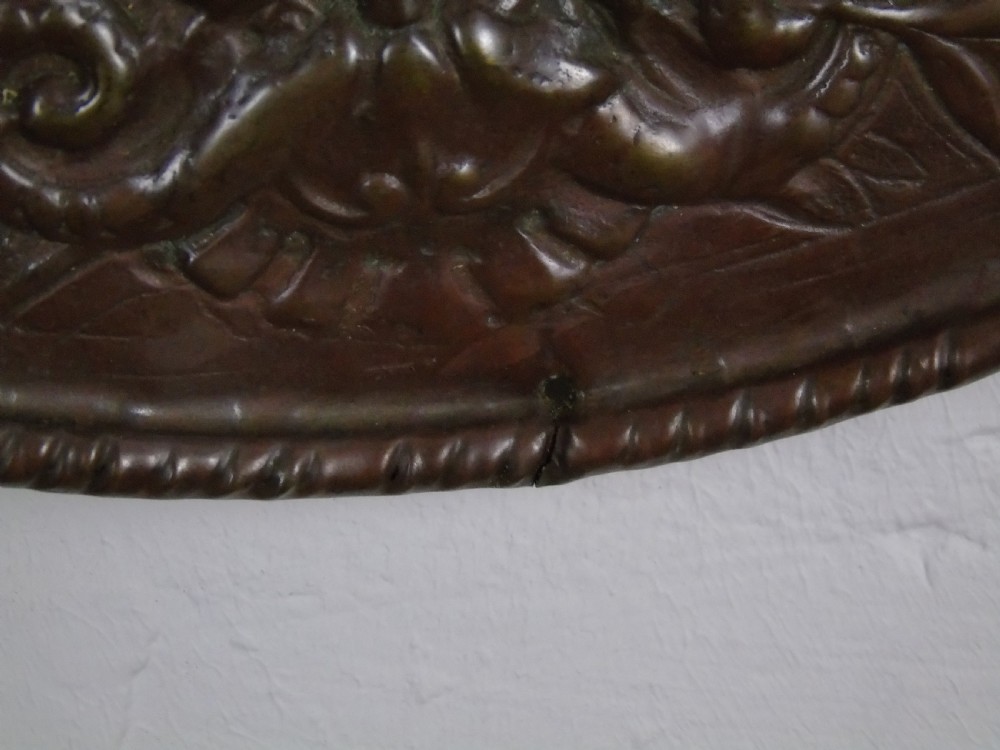 An early 18th Century repousse copper wall hanging platter View XII