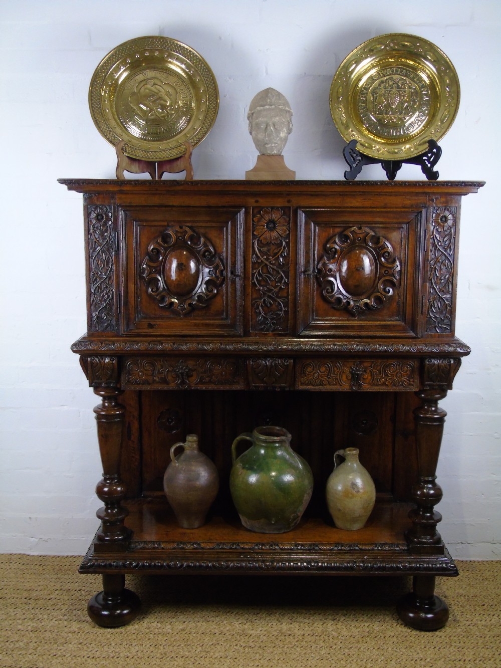 A 17th century French walnut livery cupboard