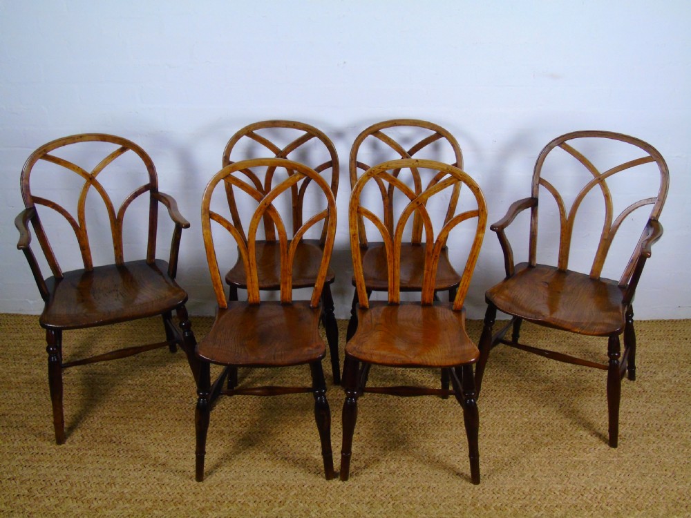 A fine set of six Gothic lace back chairs