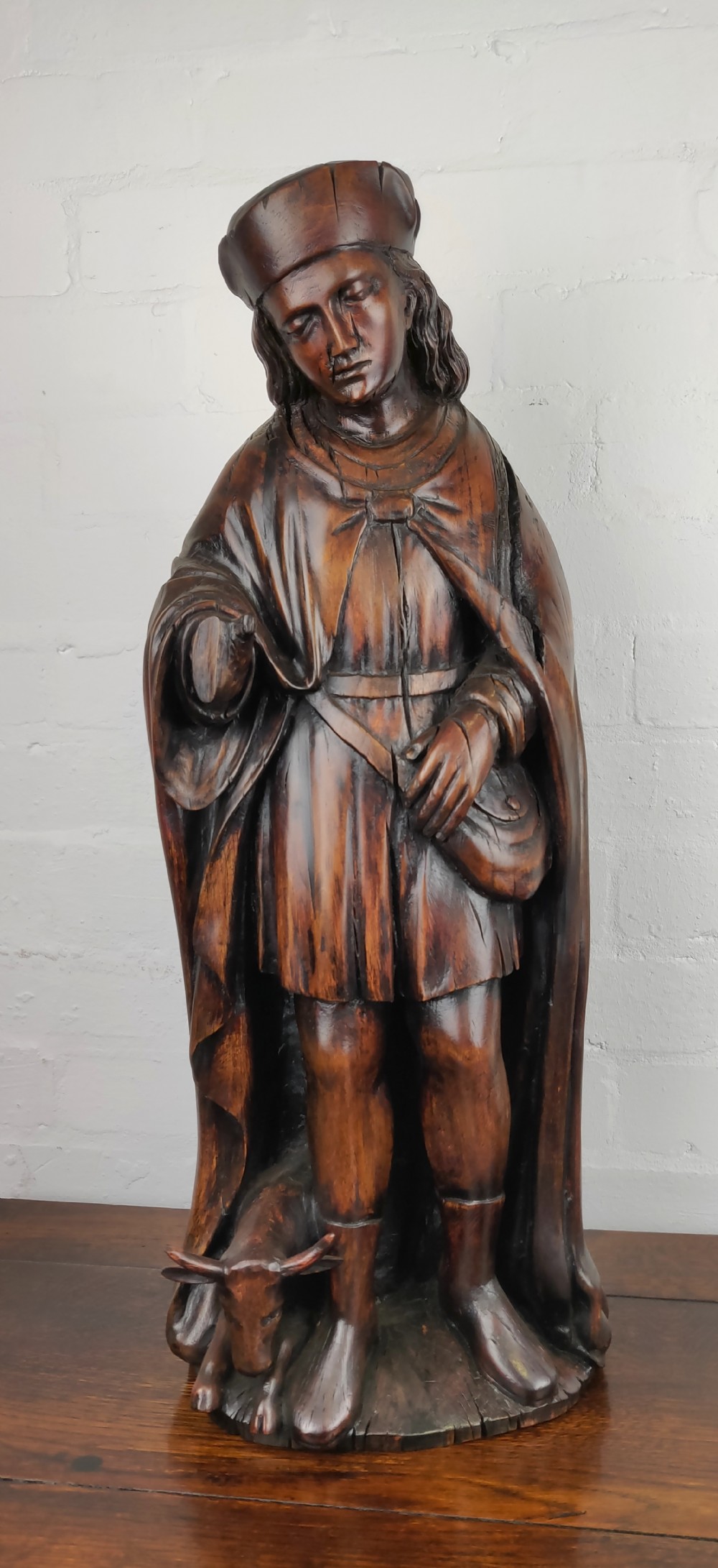 A late 17th century carved figure of Saint Wendelin of Trier