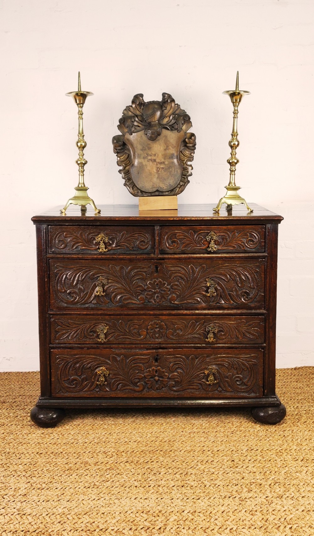 A 17th century carved chest of drawers 