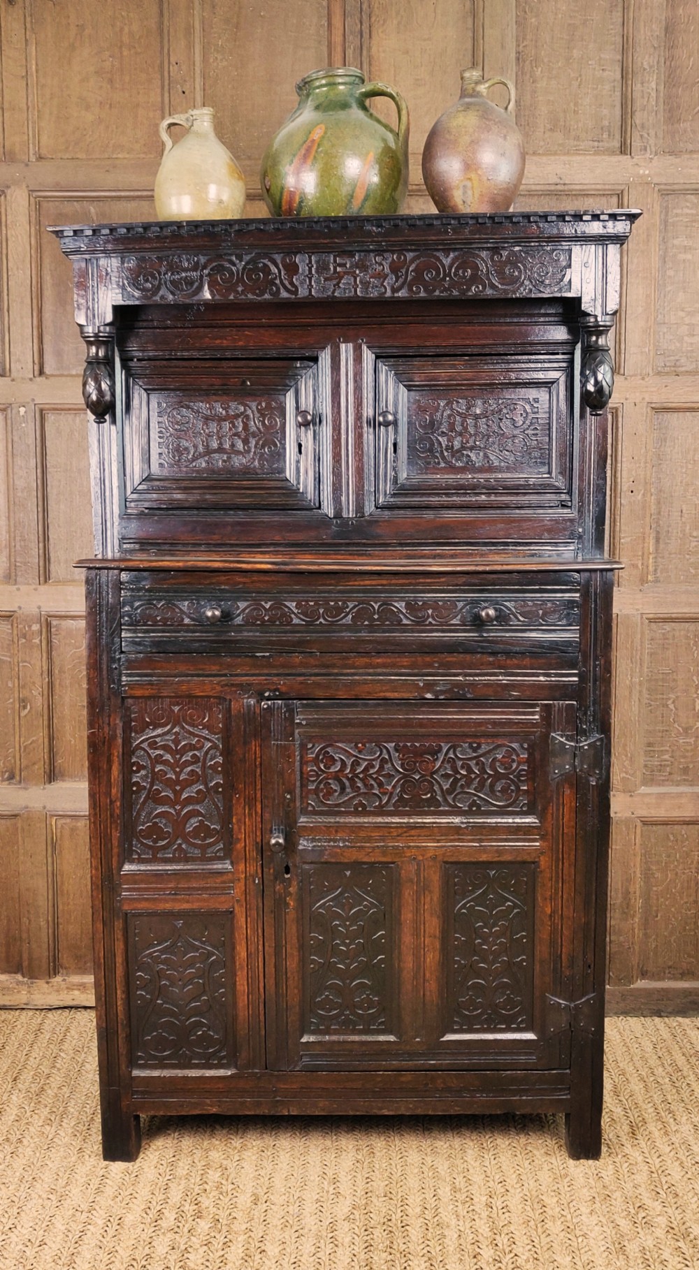 A small early 18th century west country court cupboard