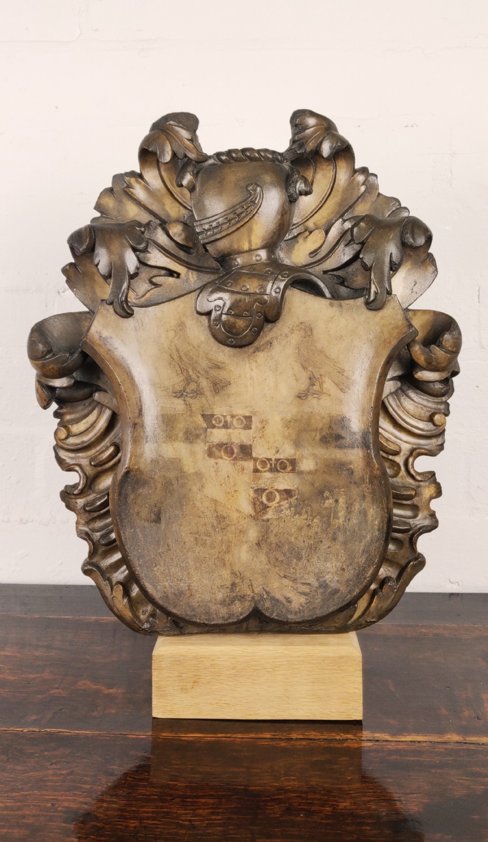 A small late 17th -early 18th century marble coat of arms