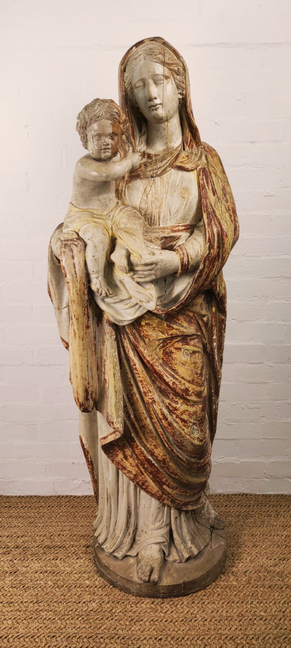 A life-size Baroque figure of Madonna and Child