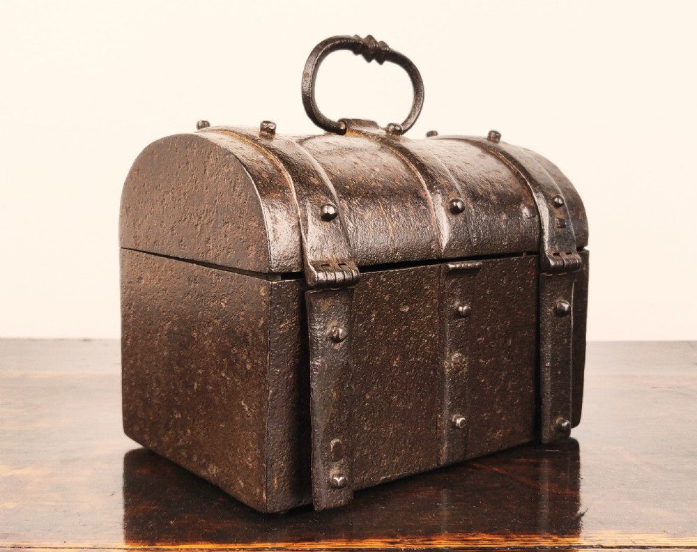 A small 16th century wrought iron dome casket