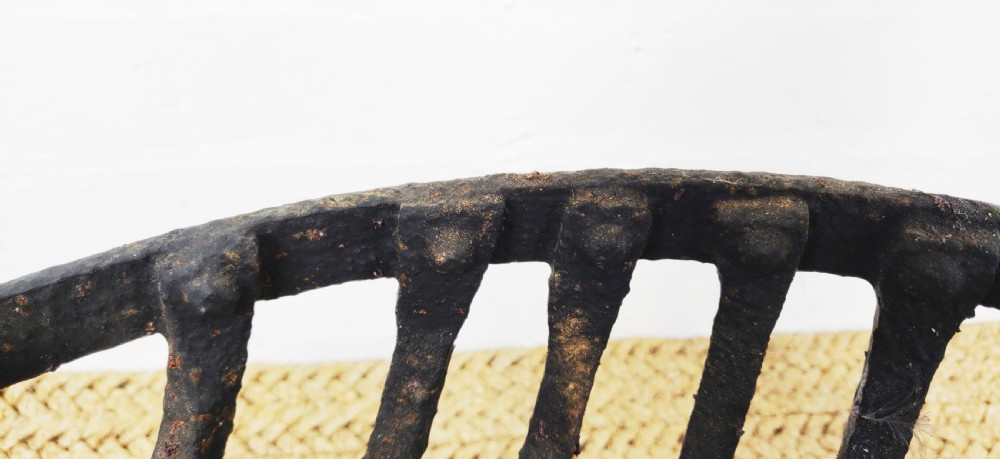 A 17th century wrought iron fire basket. View VI