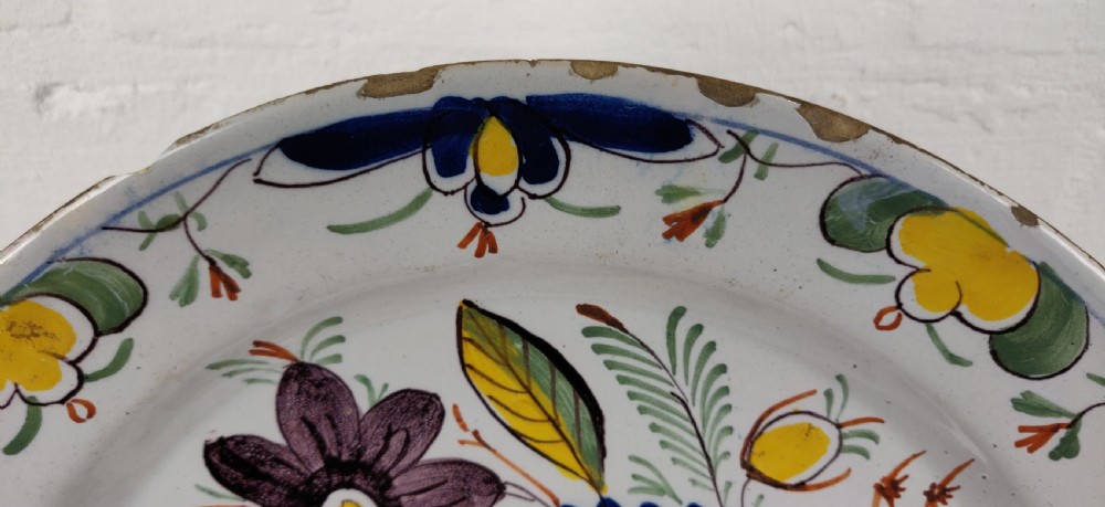A fine 18th century polychrome Delft plate. View IV