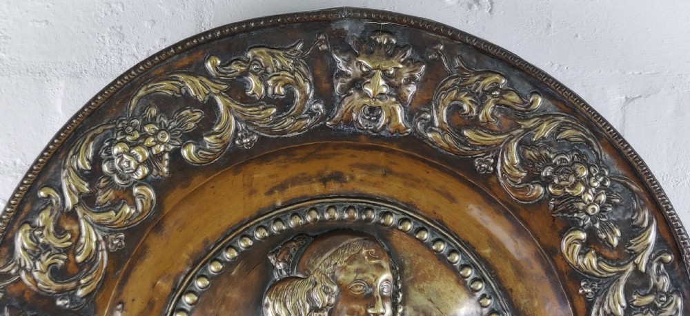 A superb 18th century copper Repoussé charger. View III