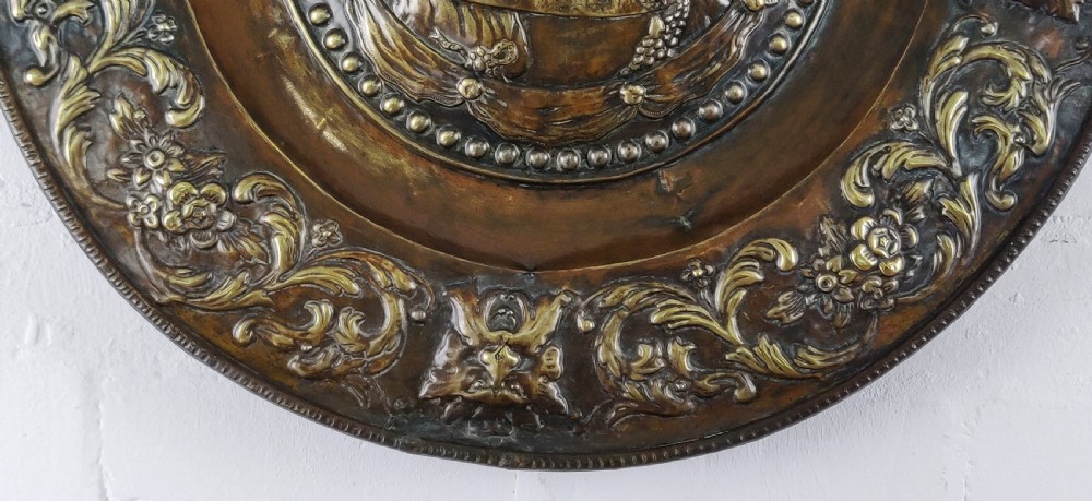 A superb 18th century copper Repoussé charger. View IV