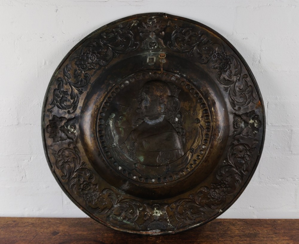 A superb 18th century copper Repoussé charger. View V
