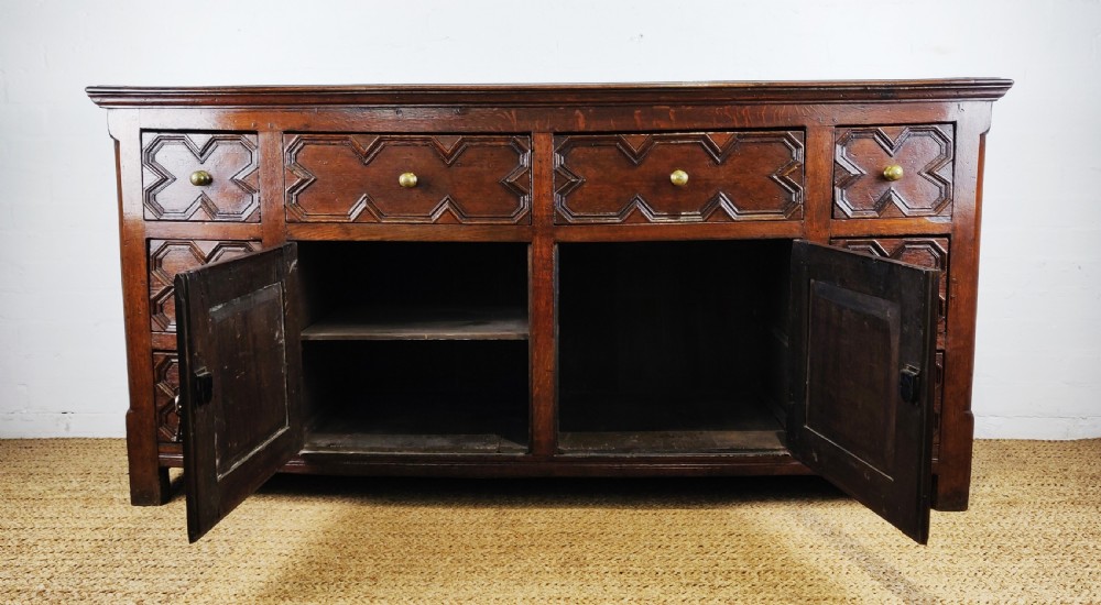 A handsome 17th century style dresser base.  View II