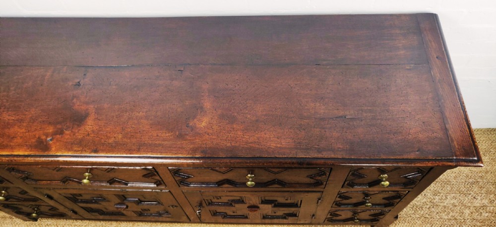 A handsome 17th century style dresser base.  View VII