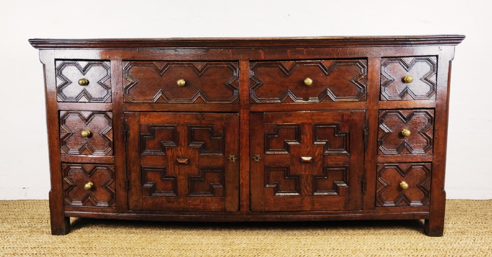 A handsome 17th century style dresser base.  View VIII
