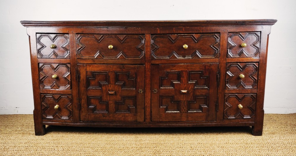 A handsome 17th century style dresser base. 
