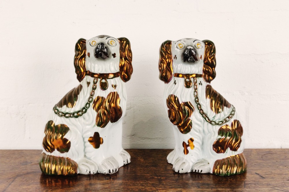 A pair of 19th century Staffordshire dogs. 