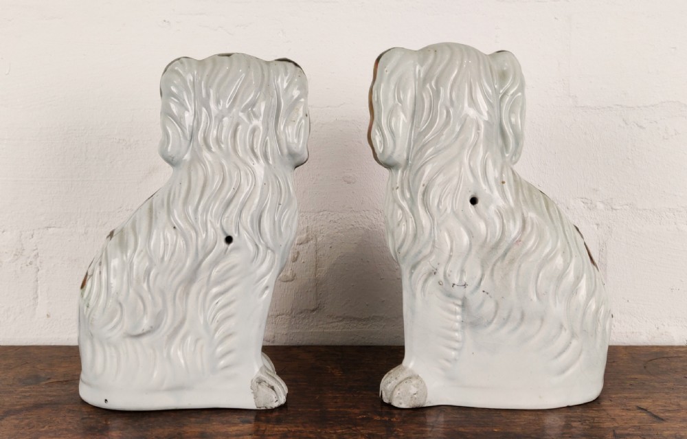 A pair of 19th century Staffordshire dogs.  View III