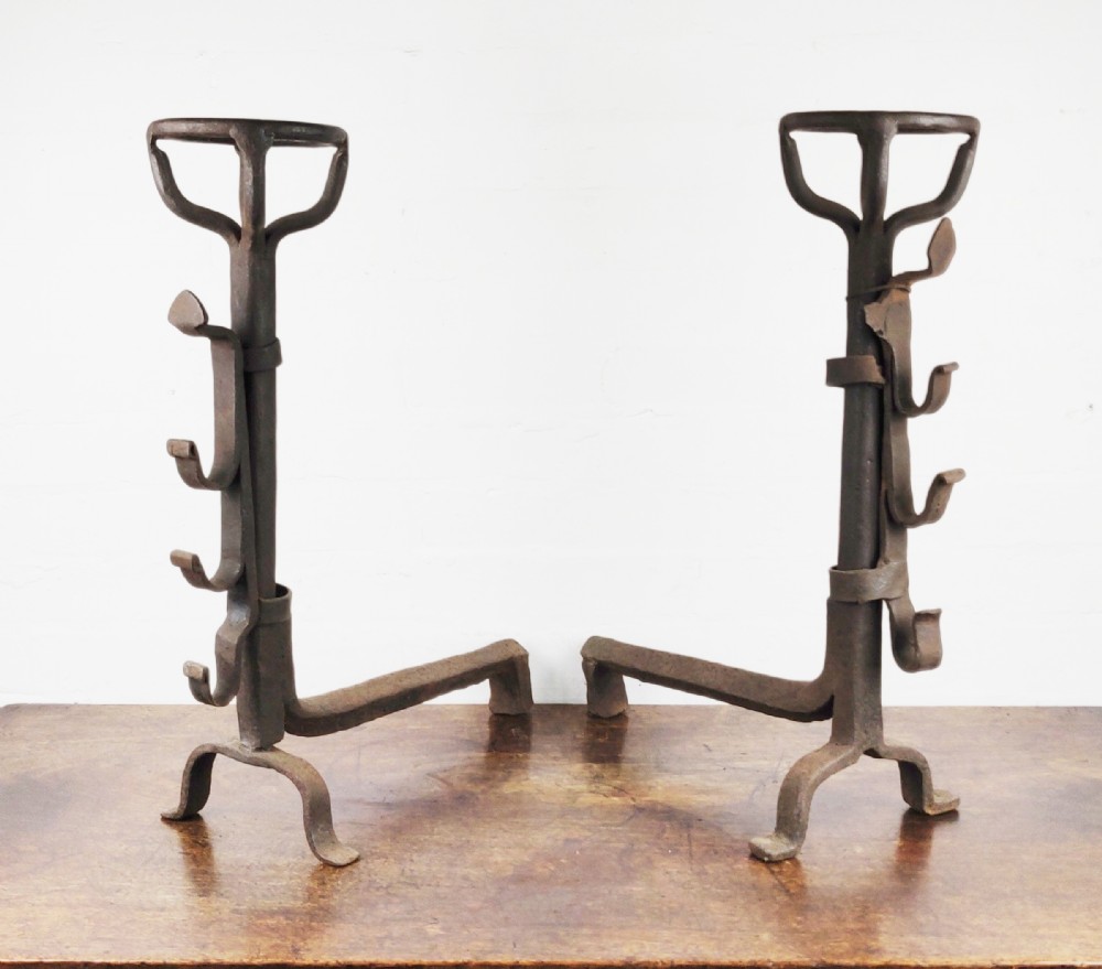 A pair of late 17th Century fire dogs