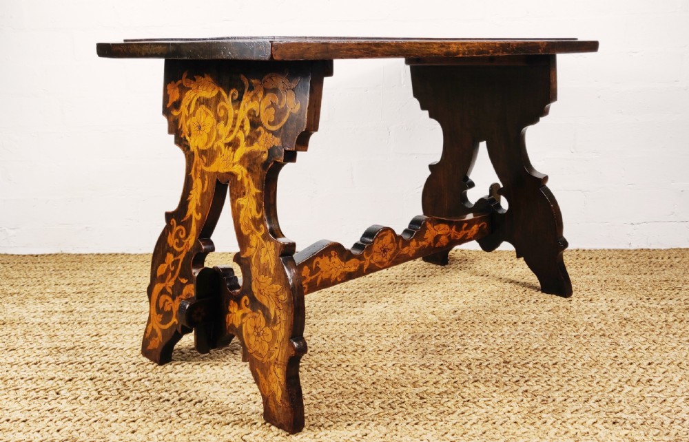 A fantastic late 19th century Italian poker work coffee table.  View V