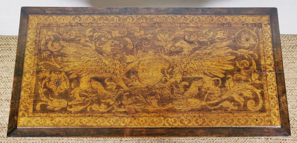 A fantastic late 19th century Italian poker work coffee table.  View IX