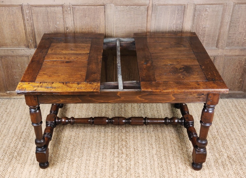 A fine late 18th -early 19th century french draw leaf table.  View III