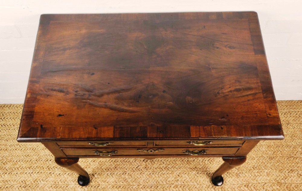 A small 18th century walnut lowboy.  View X