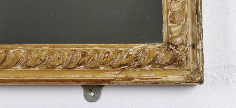 A late 18th - early 19th century carved mirror.  View II