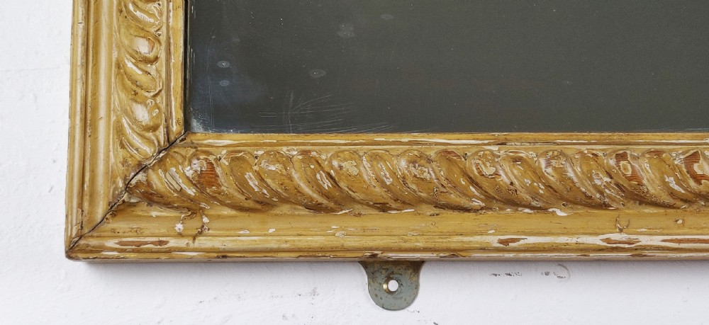 A late 18th - early 19th century carved mirror.  View III