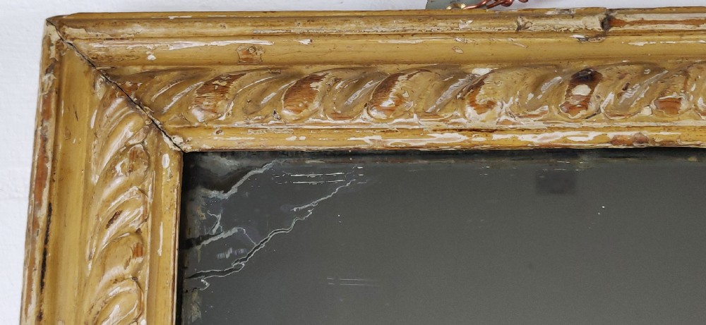 A late 18th - early 19th century carved mirror.  View IV