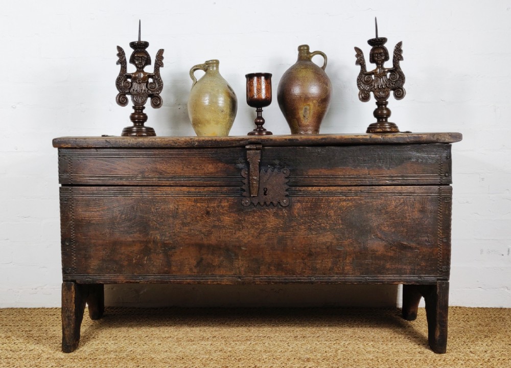A 16th century English boarded oak coffer.  View II