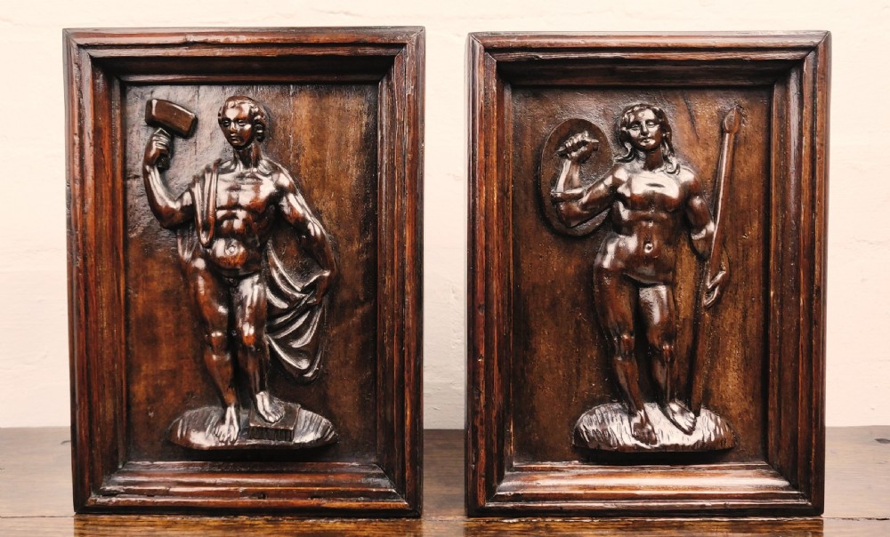 A pair of 17th century panels depicting Minerva and Vulcan.  