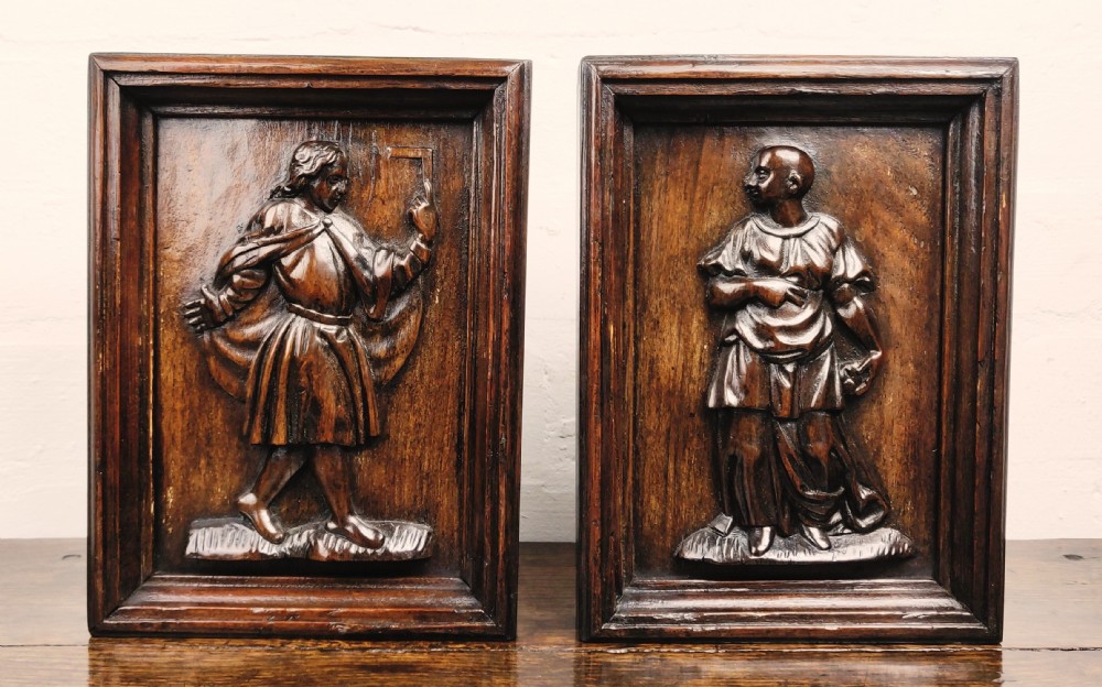 A pair of 17th century panels depicting St Thomas. 