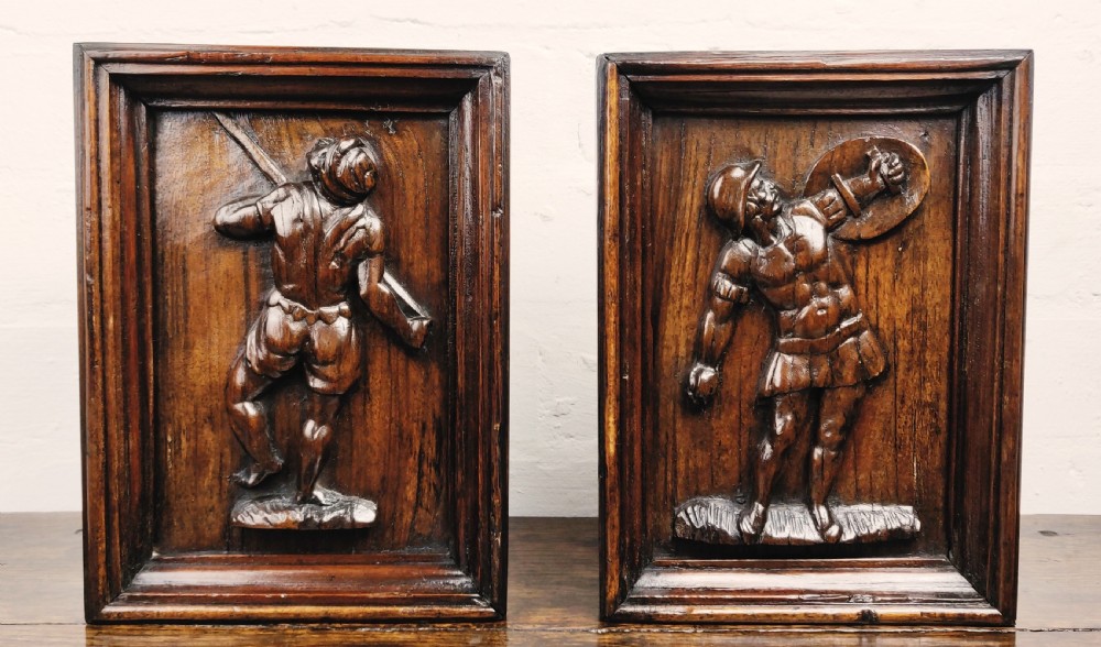 A pair of 17th century carved panels. 