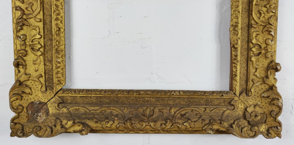 A decorative 18th century carved picture frame.  View II