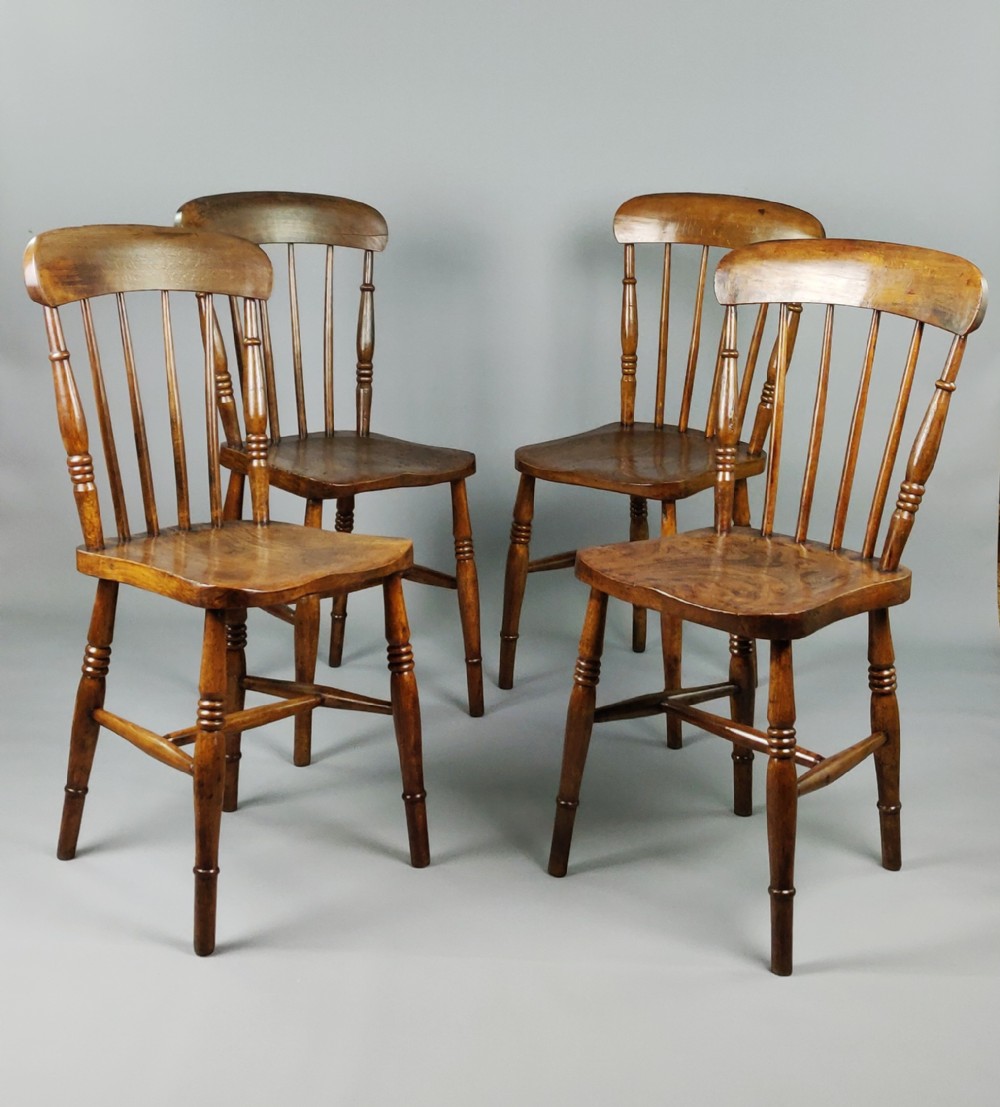 A set of four late 19th century kitchen chairs. 