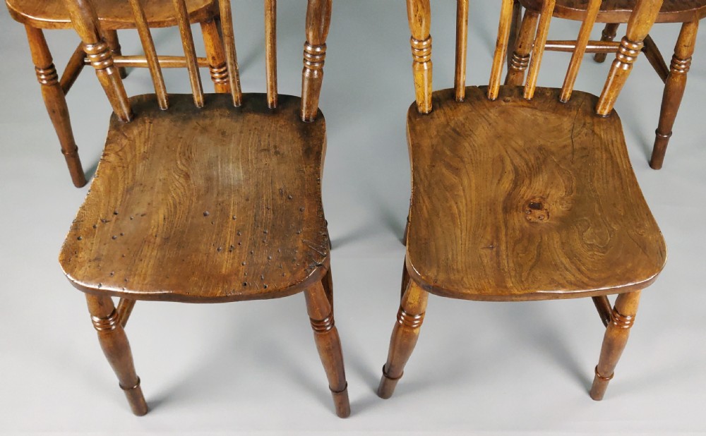 A set of four late 19th century kitchen chairs.  View VI