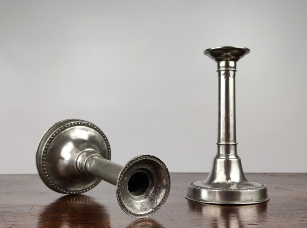A pair of Queen Anne Candlesticks. View III